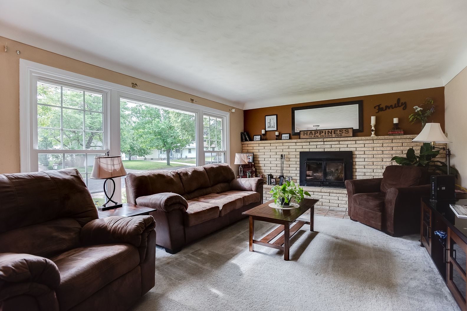 Living room remodel with large picture windows and natural light