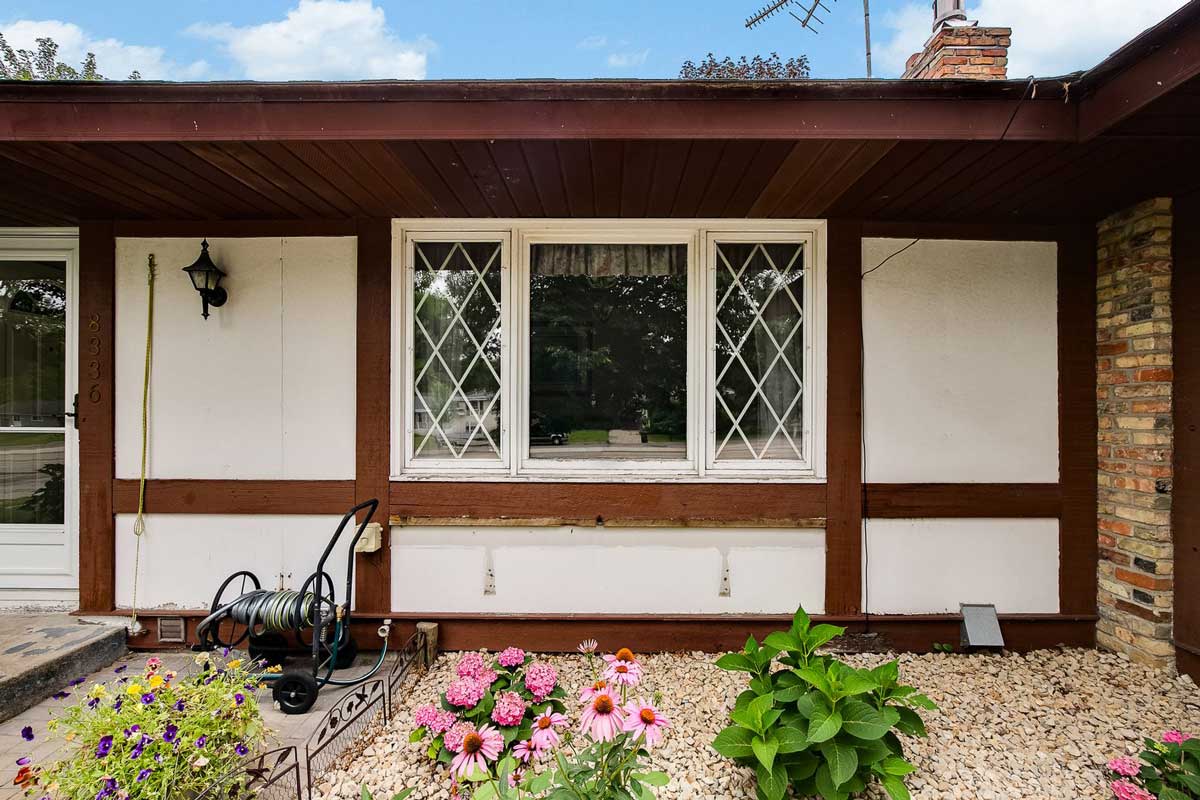 Tudor-style home with leaded glass window replacement