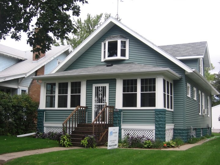 18-A Twin bungalow homes with matching new siding and window installation